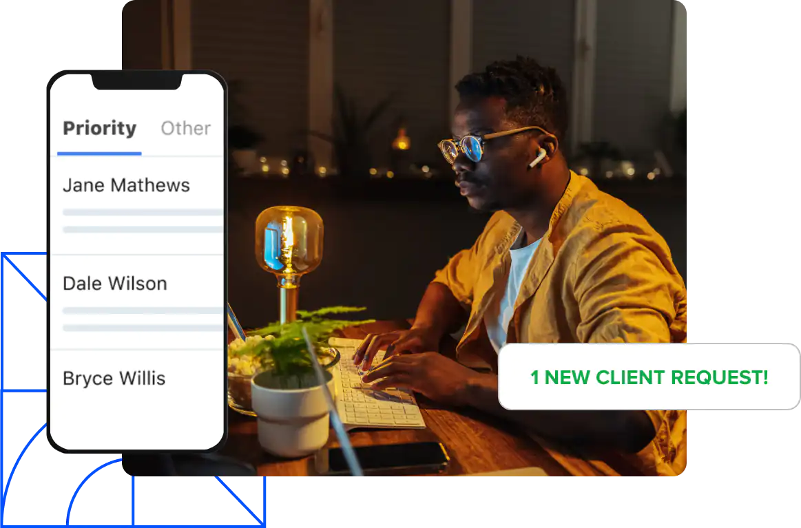 Man wearing headphones sits at a desk with a mobile screenshot of a priority email inbox